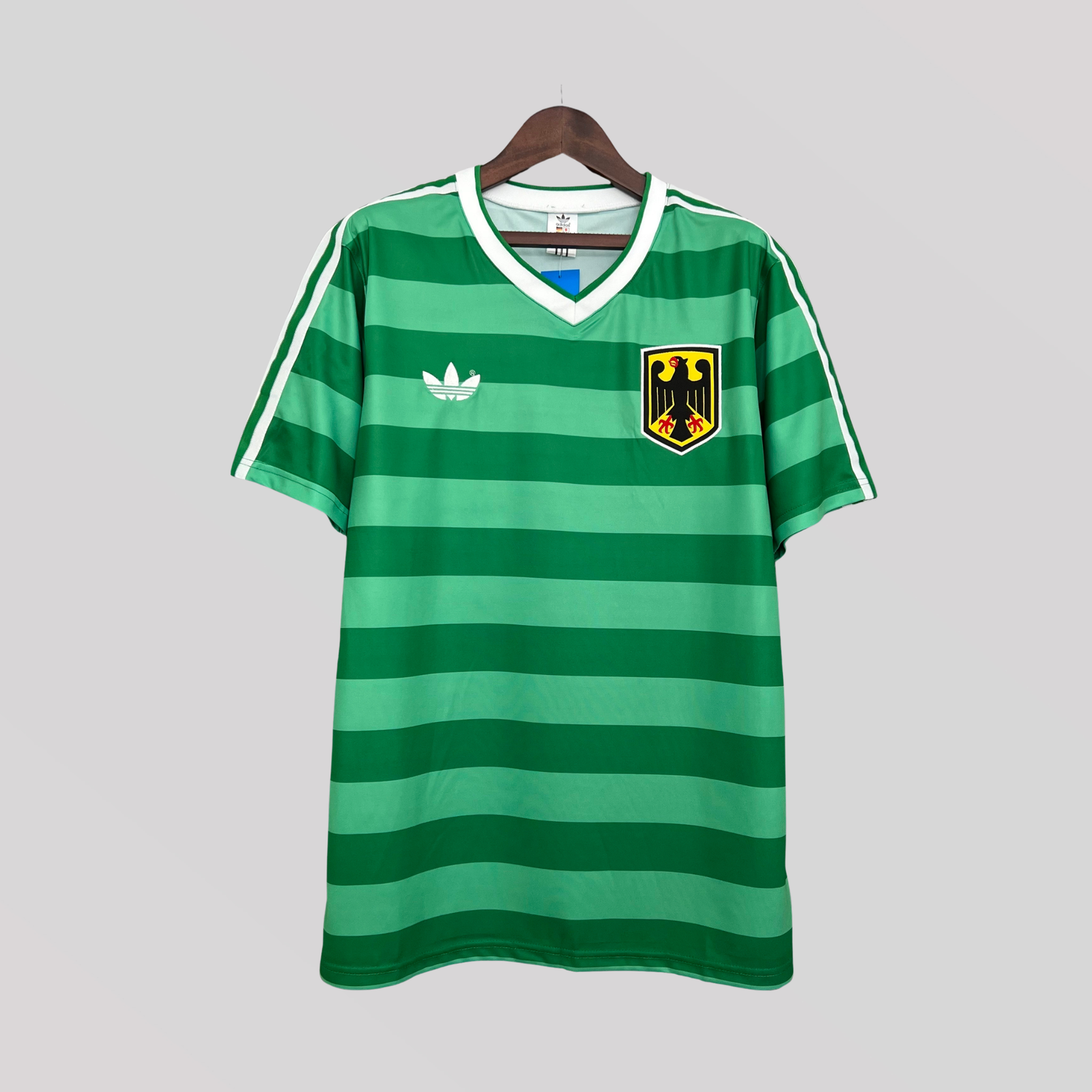1_512d3cd1-cc19-4018-a5b4-1def754fc594 Germany 1984 Green Away Retro Football Kit - Image 1